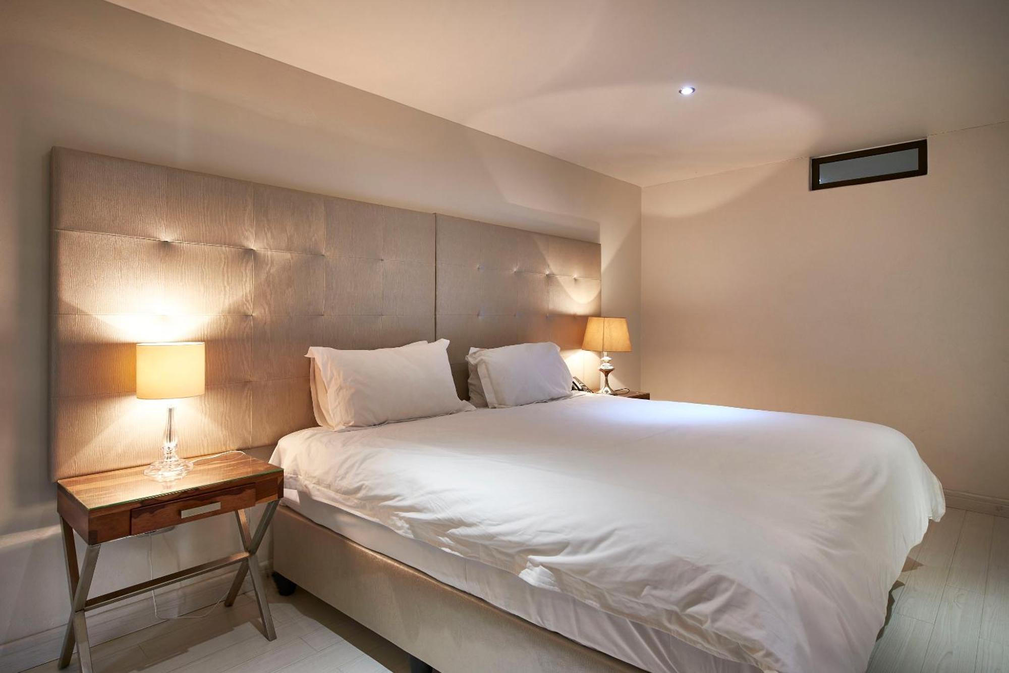 Dynasty Forest Sandown Serviced Apartments & Self Catering Hotel Йоханнесбург Номер фото